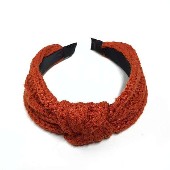 Knitted head bend, rust.